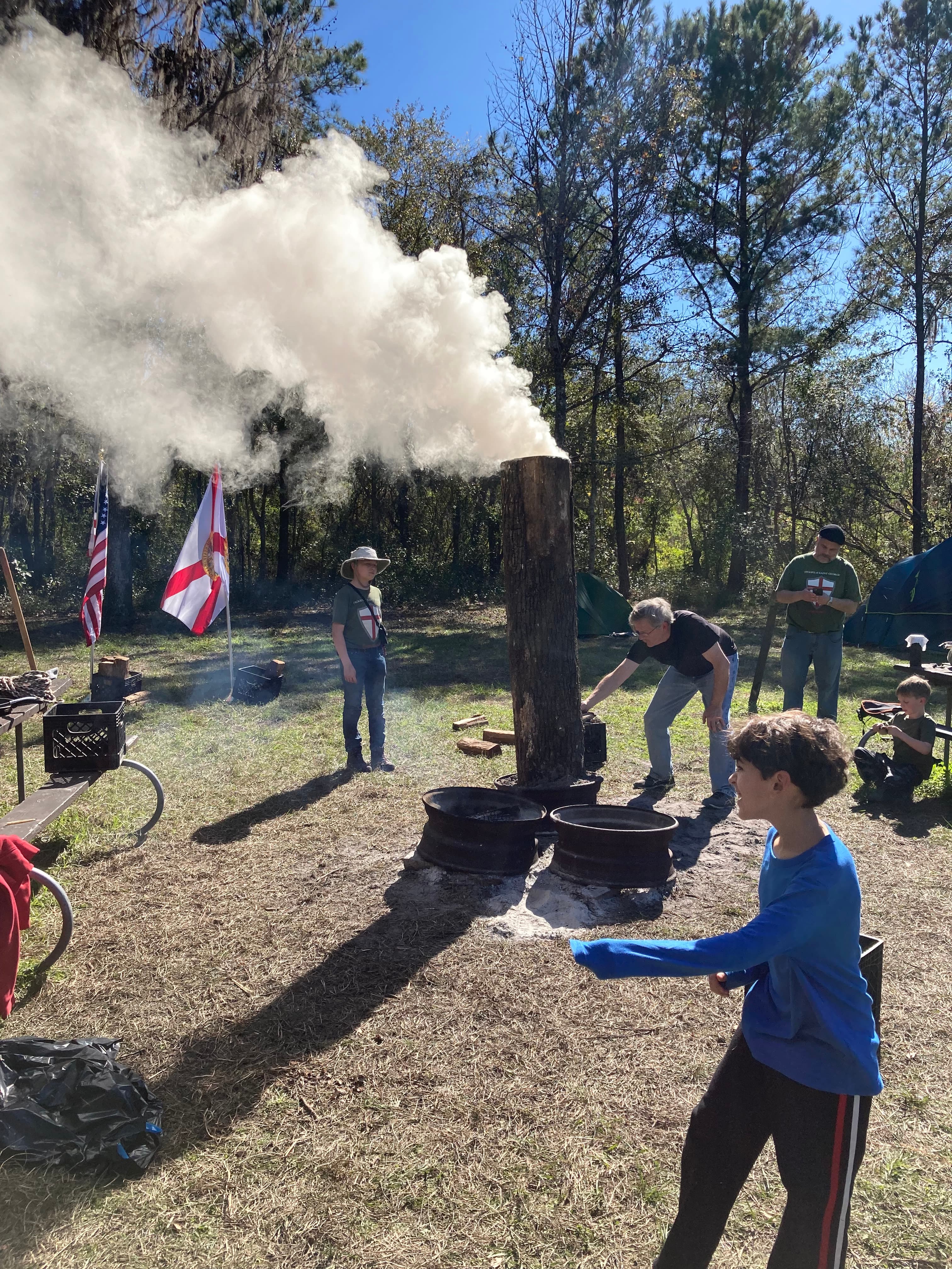 Troop 51 boys navigating rocky terrain outdoors