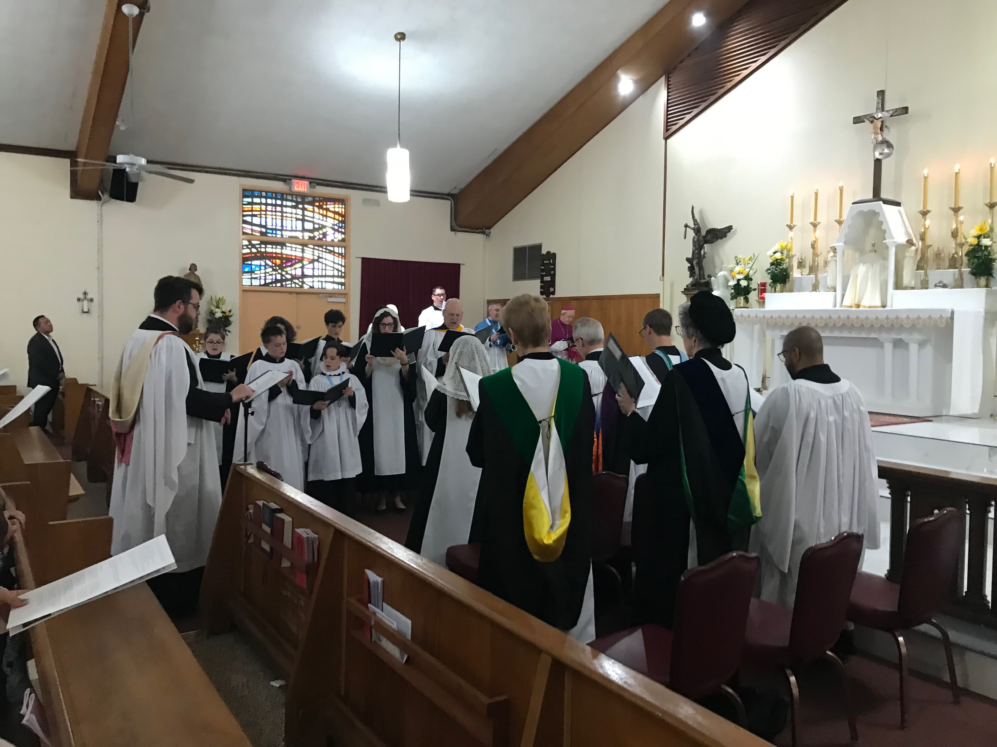 Troop fathers and families gathered outdoors for Burgers, Beer and Breviary